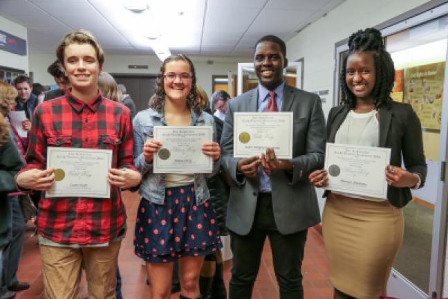 In this 2016 photo provided by Telling Room, four high school students receive Scholastic Writing Awards at a ceremony in Portland, Maine. The Telling Room is a Maine-based nonprofit writing center. Whether you're writing an email or a novel, it's…