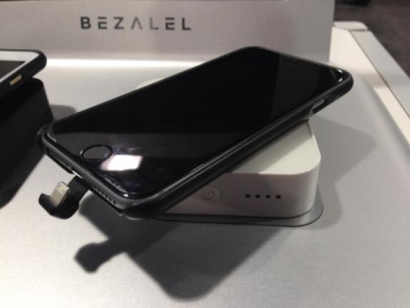 ABOVE: A charging case for an iPhone 6 sits on a wireless charger, both made by Bezalel, at the Sands Expo during the CES International gadget show in Las Vegas Thursday. The product uses the Qi wireless charging technology. AP PHOTO/RYAN NAKASHIMA…