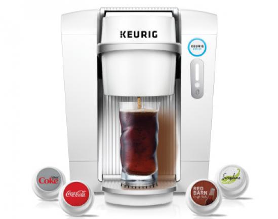 Keurig Kold machine and single serving pods. AP PHOTO