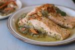 Salmon Poached in Green Salsa and Topped with Baked Chips is just as delicious cold as it is hot. AP PHOTO/MATTHEW MEAD