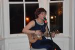 Bobbie Ann Craigie sings for the crowd during open mic night in Jim Thorpe.