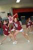 Gail Maholick/TIMES NEWS Lehighton High School cheerleaders Megan Turpin, Sydney Schafer and Haley Sawyer give Gianna Heller a taste of cheer leading during a pep rally held at Franklin Elementary School.
