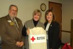 LINDA KOEHLER/TIMES NEWS Rotary District Governor Elect Bob Wehe and Red Cross Gail Toscano from the Red Cross of Monroe County help get the word out to West End Rotary Club members how to prepare for a disaster or emergency. Toscano hands WERC…