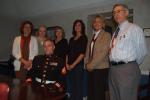 TERRY AHNER/TIMES NEWS  Sgt. Jake McCloskey (seated), United States Marine Corp. is joined by Pencor Services Inc. employees (l-r) Mary Beers, Carleen Ladden, Connie Kravelk, Julianne Farina, Paula Patterson, and Tom Lager during a visit Tuesday to…