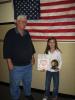 STACEY SOLT/SPECIAL TO THE TIMES NEWS Lehighton AMVETS chaplain James Wentz, left, stands with AMVETS poster contest winner Maura Phelan. Phelan is now in fourth grade at Mahoning Elementary School. She earned first place in the Lehighton AMVETS …
