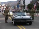 LIZ PINKEY/SPECIAL TO THE TIMES NEWS George Breunig (seated in car, left), a US Navy veteran, wore his 1943 uniform to the Tamaqua Veterans Day Parade. A World WarII veteran, Breunig served as a petty officer, gunner's mate during the War.