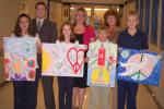 JOE PLASKO/TIMES NEWS Tamaqua Lions Club Peace Poster contest winners from Tamaqua Area Middle School included, front from left, Francesca DiFiore, third place, ages 12-13; Nicole Prantow, first place, age 11 and overall District winner; David…