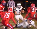 BOB FORD/TIMES NEWS Northern Lehigh's Jake Kern looks for running room as North Schuylkill's Tanner Dean and Mike Shinkus move in.