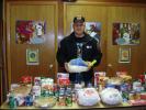 MARY TOBIA/SPECIAL TO THE TIMES NEWS Bradley Billig, a member of the Living Hope Lighthouse Church in Palmerton and of the Christian Motorcycle Association accepted all this bounty from the food collected by the Ladies Auxiliary of R.W. Fritzinger…