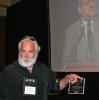 Special to the TIMES NEWS Russell "Rooster" Valentini receives the Sandra Neece Lifetime Award Achievement for the National Association for the Education of Homeless Children and Youth.