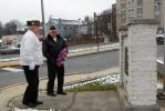 RON GOWER/TIMES NEWS Frank Bayer, right, president of the World War II Last Man's Club in Lehighton, hands a wreath to Glenn Troutman of the Lehighton United Veterans Organization, during a Pearl Harbor remembrance program, yesterday, in Lehighton…