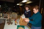 KAREN CIMMS/TIMES NEWS Mitzi-Jo McElhenney, left, and Joan Melber, right, unpack one of the many nativities that will be on display at St. John's Lutheran Church, 319 South Ave., Jim Thorpe. There will be over 150 crÃ¨che and nativity scenes, some…