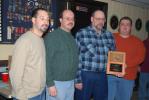 Ron Gower/TIMES NEWS Ed Nunemacher, third from left, accepts the Fireman of the Year Award during the annual Christmas dinner of the Diligence Hose Company of Summit Hill. Looking on during the presentation are, from left, Rich Gould, a fire company…