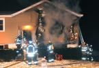 LARRY NEFF/SPECIAL TO THE TIMES NEWS A Rush Township home sustained heavy damage Saturday morning. Fire officials believe the fire started in the area of a wood burner.