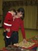 STACEY SOLT/SPECIAL TO THE TIMES NEWS Young Chad Kimmel looks ready to meet the man in red, as his mother Mary-Louise Kimmel looks through the baked goods for sale. Both are from Jim Thorpe. Not shown in Stephanie Dykas, a Girl Scout volunteering at…
