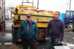 TERRY AHNER/TIMES NEWS Ed Ziegler (left) and Richard C. Firely (right), project manager, look on during a subcontractors meeting Monday morning at the site of Ziegler's business along Route 873 in Slatington.