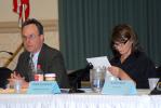 Ron Gower/TIMES NEWS Conducting hearing last night at Jim Thorpe Memorial Hall to gain input on changing the 570 area code dialing either by splitting it with a new area code or adding an area code overlay are Joel H. Cheskis, left, from the Pa…