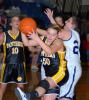 Ron Gower/TIMES NEWS Panther Valley's Sam Zlock (50) appears to have won this battle for a rebound with Tamaqua's Cassie Eroh. Looking on is PV's Dana McFadden.
