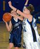 bob ford/times news Northern Lehigh's Tina Bastardi (left) is fouled hard by Palmerton's Kelsey Hay.