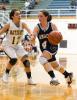 bob ford/times news Tamaqua's Kayla Hope (4) takes the ball to the basket against Kiely Chaklos of Nativity.