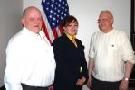 Ron Gower/TIMES NEWS Grant Hunsicker, right, president of Lehighton Borough Council, welcomes Nicole Tessitore, who was hired as the new treasurer and assistant secretary. Looking on, at left, is borough manager John C. Wagner.