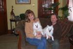 Sandra Wingert holds Pixie Dust, a toy American Eskimo dog, and Todd holds Jewels, the first dog of the breed that they owned.
