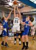 STEVE SHINKO/Special to THE TIMES NEWS Tamaqua's Amy Zehner takes a shot over Palmerton defenders Jen Snyder (left) and Kristen Romano (right) during Tuesday's District 11 Class AAA girls semifinal game at Blue Mountain High School in Orwigsburg.