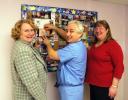 AL ZAGOFSKY/SPECIAL TO THE TIMES NEWS Certified Nurse Midwife Linda Anderson, left, Dr. Alessandro Boschi, and Certified Nurse Midwife JoAnn Haas add pictures of babies they delivered to the picture board at their Lehighton office. The trio wants…