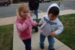 Gail Maholick/TIMES NEWS Trey Sterling and Winter Horner, youngsters at Curious Kids Play and Learn Place, pull a wagon loaded with non perishable food items to the Trinity Food Pantry.