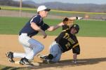 NANCY SCHOLZ/TIMESÂ NEWS Northwestern's Payton Bachman slides into third base ahead of the throw to Mike Streisel of Tamaqua. The Tigers rallied for a 25-15 victory in Thursday's game.