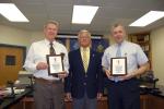 Dick Nothstein, center, temporary manager of Special Olympics of Carbon County, presents plaques to Charles Getz, left; and William O'Gurek, right, to thank them for their past four years of service as co-managers.