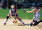 Northern Lehigh's Kayla Toth slides safely into second base as Palmerton's Katie Reimer goes down to scoop up a low throw.