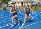 steve shinko/special to the times news Panther Valley's Krista Mantz (right) hands the baton off to Olivia Markovich during the girls' 400 relay Thursday against Tamaqua.