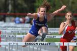 nancy scholz/special to the times news Palmerton's Kristen Romano clears a hurdle on her way to a victory in the 100 against Saucon Valley.