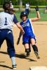 bob ford/times news Alura Bellis of Pleasant Valley slides safely into third base as Brittany Allivato of Pocono Mountain West awaits the throw.