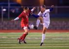 bob ford/times news Pleasant Valley's Kayla Dorney (right) and Angela Munoz of Pocono Mountain East battle for control of the ball.
