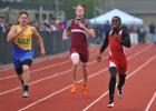 steve shinko/special to the times news Jim Thorpe's Kareem Mickens (right) finished first and Marian's Paul Martin finished second in the boys' 400 meter dash at the Schuylkill League Track Field Championships. In the center is Pottsville's Casey…