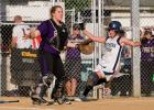 steve shinko/times news Northern Lehigh's Julie Wagaman scores as Palisades' catcher Marybeth Sadow waits for the ball during Thursday's Colonial League Championship game.