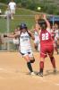 nancy scholz/times news Northern Lehigh's Julie Wagaman (left) beats out an infield single as Pine Grove second baseman Toni Dissinger stretches for the throw.