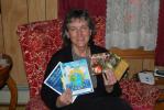 Ron Gower/TIMES NEWS Kathy Long of Lehighton holds copies of books she has written and CDs she had produced. She has put some of her favorite, self-composed stories onto a CD and will have a CD release party at 7 p.m. Wednesday in Godfrey Daniels,…