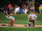 BOB FORD/TIMES NEWS Parker David of the Franklin Red Sox gets back to first safely as Panther Valley Black Diamonds first baseman Jeff Corby takes the throw.