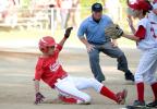 Lansford's Hunter Nauss slides into third base in the second inning as White Haven's Mike Lunney waits for the throw. Nauss scored Lansford's lone run of the day in a 4-1 loss. Bob Ford/ TIMES NEWS