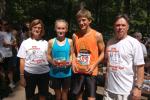 JOE PLASKO/TIMES NEWS Winners of the Truskey Memorial 5K Run at Tuscarora State Park were, second from left, Paige Stoner of Pottsville and Nathan McClafferty of Conrad Weiser. With the winners are Pat and Wayne Truskey, who sponsor the race in…