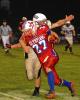 steve shinko/times news Jim Thorpe's Jon Fritz (27) carries the ball as Tamaqua's Matt Edmonds tries to make the tackle.