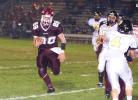 bob ford/times news Lehighton's Jacen Nalesnik (88) followers his blockers after taking a handoff. Kevin Dunn (4) is the Panthers' defender.