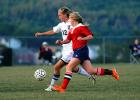 Steve Shinko/Special to THE TIMES NEWS Tamaqua's Ali Updike (12) keeps control of the ball during a game earlier this season against Jim Thorpe. Updike is the leading goal scorer in the Schuykill League this fall.