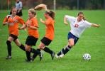 bob ford/times news Jim Thorpe's Cat Condly (17) crosses over with the ball as Weatherly defenders Sara Heiser (20), Jaime Dougherty (7) and Devon Bizarre all run past her.