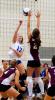PATRICK DEUTSCH/Special to THE TIMES NEWS Pleasant Valley's Crystal Cambria (17) hits the ball back over the net as Lehighton's Laureen DiMattia goes up to try and block it.