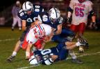 bob ford/times news Jim Thorpe's Terry Moll is brought down by Northern Lehigh defenders Kirk Bender (40), Trevor Yashur (on ground) and Caleb Johnson (86).
