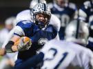 BOB FORD/TIMES NEWS Northern Lehigh's Cody Remaley breaks loose for one of his first half touchdowns as Wilkes-Barre GAR's Shaliek Powell looks on. The Bulldogs rolled to a 50-14 victory in the first round of the PIAA playoffs.
